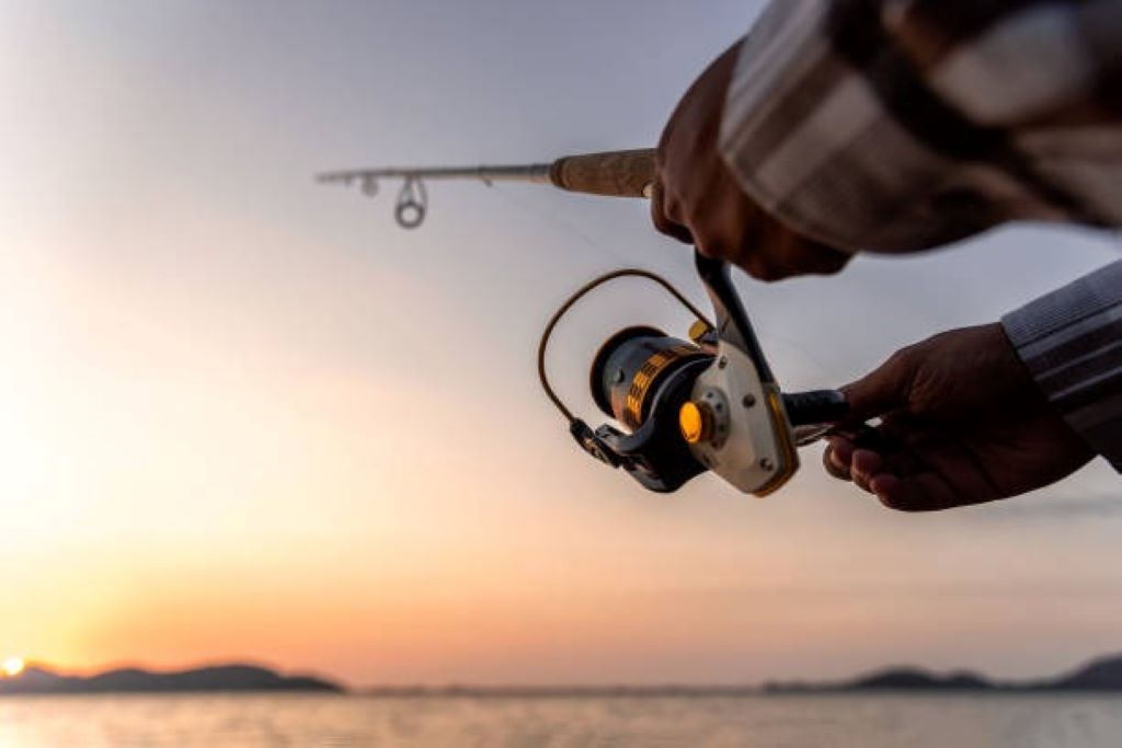 Close-up of fishing lines and reels used by Canadian anglers on a dock