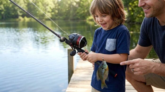 KastKing Brutus reel beside fishing tackle equipment